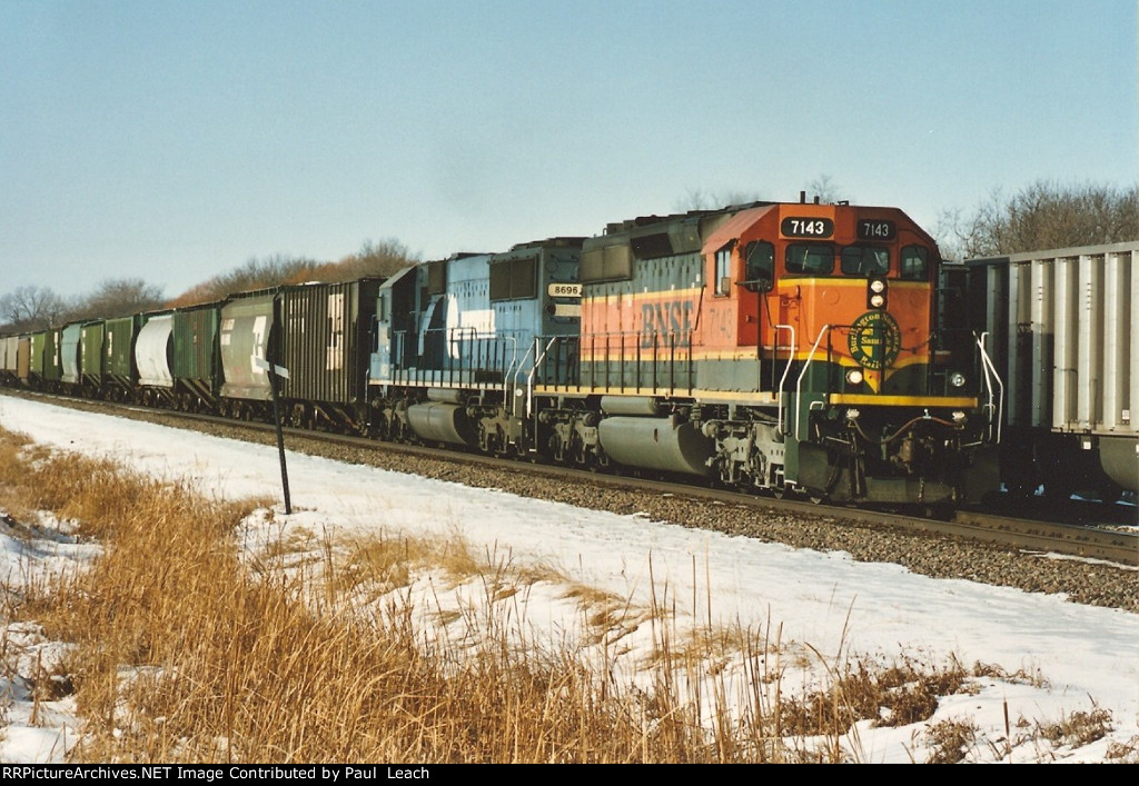 Grain train rolls east